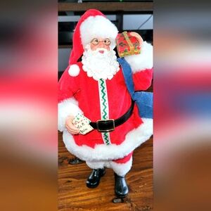 Festive Santa Claus Figurine in Red and White